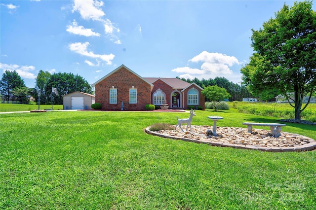 116 Camille Dr, Shelby, NC 28150 - view of front of house featuring an outbuilding, a front lawn, brick siding, and a garage