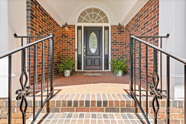 2241 Flagstick Dr, Matthews, NC 28104 - view of exterior entry with brick siding and a porch