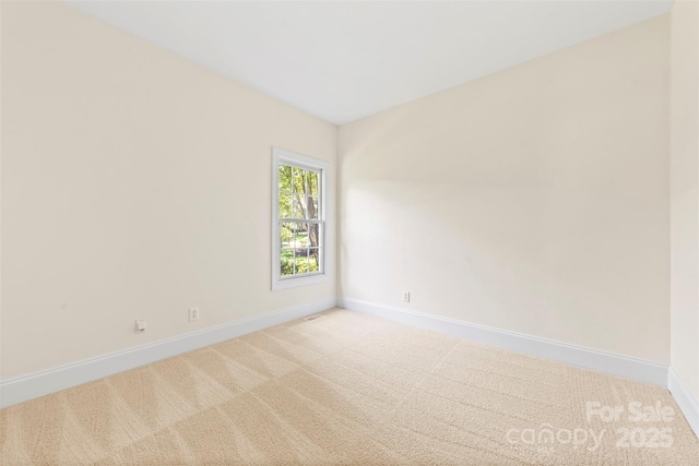 2241 Flagstick Dr, Matthews, NC 28104 - unfurnished room with baseboards and carpet