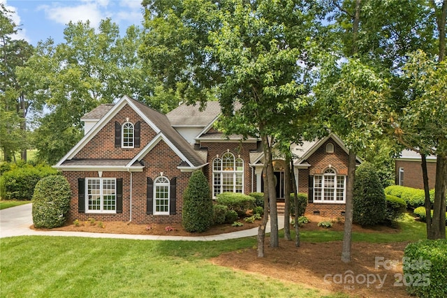 2241 Flagstick Dr, Matthews, NC 28104 - view of front of home featuring brick siding, a front lawn, and crawl space