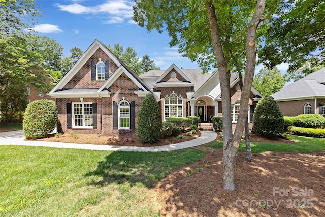 2241 Flagstick Dr, Matthews, NC 28104 - view of front of property with brick siding and a front yard