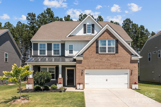 169 Rooster Tail Ln, Troutman, NC 28166 - craftsman-style house with brick siding, board and batten siding, an attached garage, and a front yard
