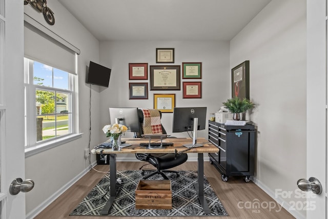 169 Rooster Tail Ln, Troutman, NC 28166 - home office with wood finished floors and baseboards