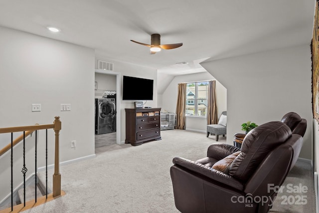 169 Rooster Tail Ln, Troutman, NC 28166 - living area featuring washing machine and dryer, light carpet, a ceiling fan, and vaulted ceiling