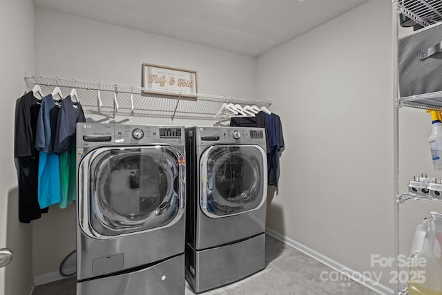 169 Rooster Tail Ln, Troutman, NC 28166 - laundry room featuring independent washer and dryer and baseboards