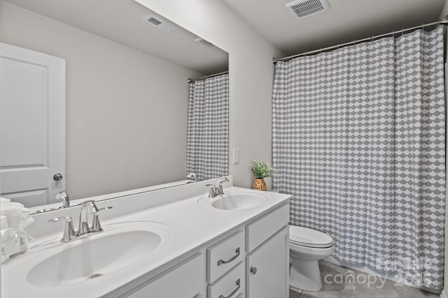 169 Rooster Tail Ln, Troutman, NC 28166 - bathroom featuring double vanity, tile patterned flooring, and curtained shower
