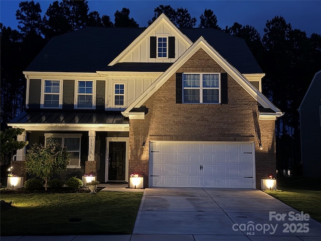 169 Rooster Tail Ln, Troutman, NC 28166 - craftsman inspired home with board and batten siding, an attached garage, driveway, and brick siding
