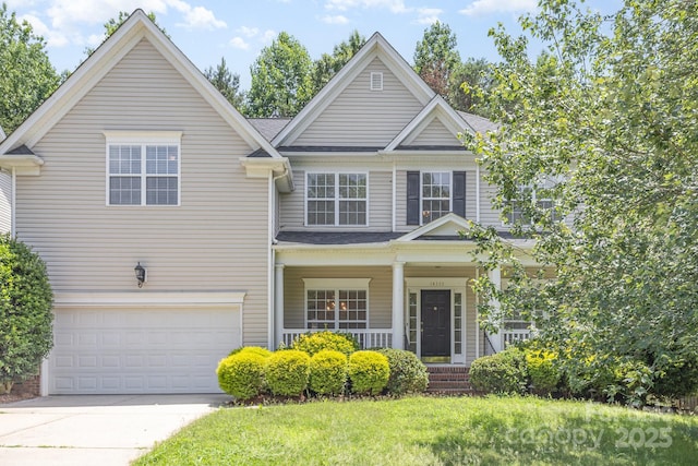14333 Maclauren Ln, Huntersville, NC 28078 - traditional-style home with an attached garage, a porch, concrete driveway, and a front lawn