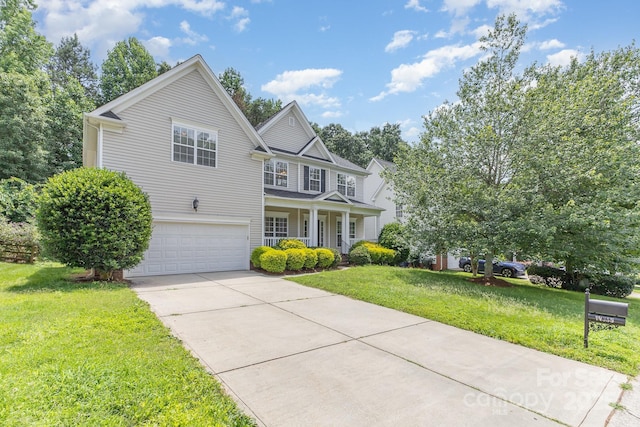 14333 Maclauren Ln, Huntersville, NC 28078 - traditional-style home with a garage, concrete driveway, a front yard, and a porch