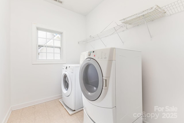 14333 Maclauren Ln, Huntersville, NC 28078 - laundry room with independent washer and dryer and light floors