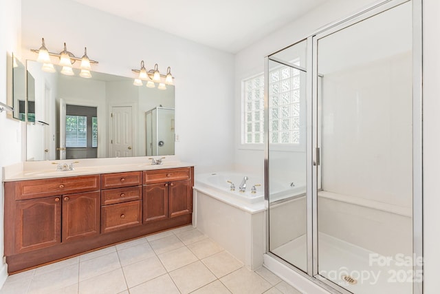 14333 Maclauren Ln, Huntersville, NC 28078 - bathroom with a bath, a stall shower, double vanity, and tile patterned floors