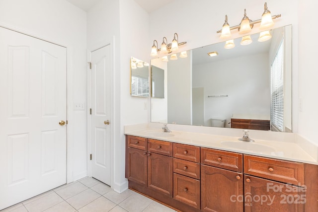 14333 Maclauren Ln, Huntersville, NC 28078 - bathroom with double vanity and tile patterned flooring