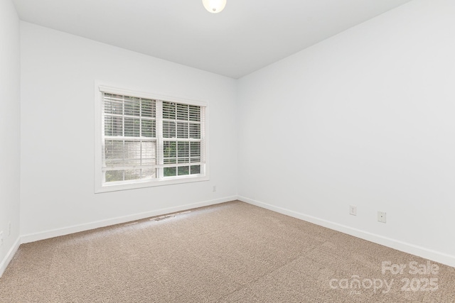 14333 Maclauren Ln, Huntersville, NC 28078 - unfurnished room with carpet floors and baseboards