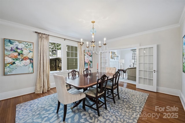 726 E Kingston Ave, Charlotte, NC 28203 - dining room with a chandelier, crown molding, and wood finished floors