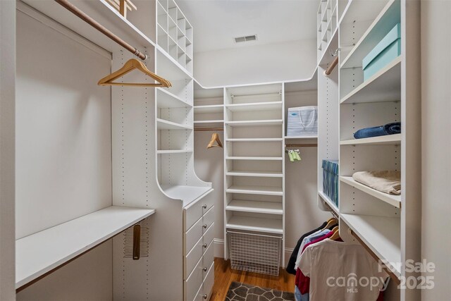 726 E Kingston Ave, Charlotte, NC 28203 - walk in closet featuring wood finished floors