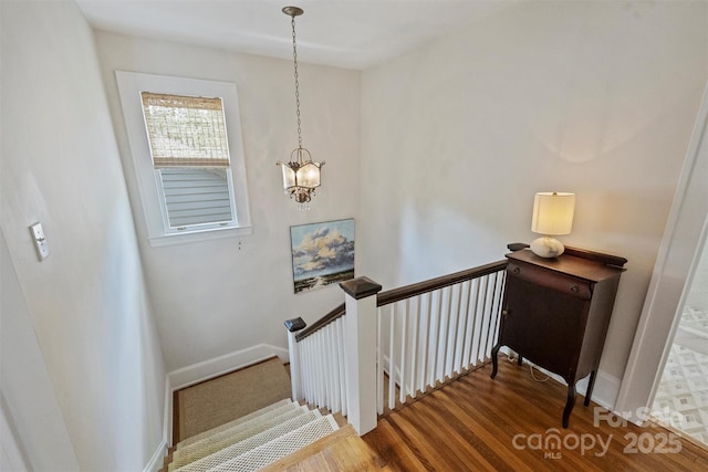 726 E Kingston Ave, Charlotte, NC 28203 - stairs featuring a chandelier and wood finished floors