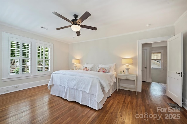 726 E Kingston Ave, Charlotte, NC 28203 - bedroom featuring dark wood finished floors, crown molding, and ceiling fan