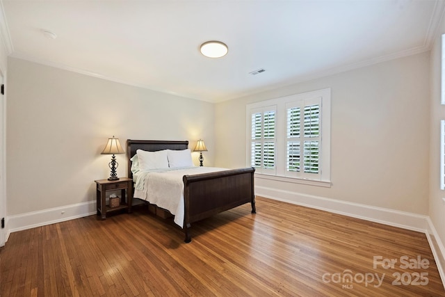 726 E Kingston Ave, Charlotte, NC 28203 - bedroom featuring hardwood / wood-style floors and crown molding