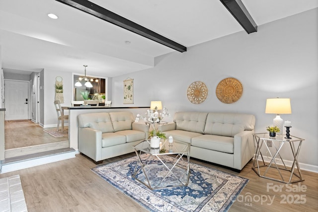5192 Corbin Ln, Hickory, NC 28601 - living area with beamed ceiling, wood finished floors, a chandelier, and recessed lighting