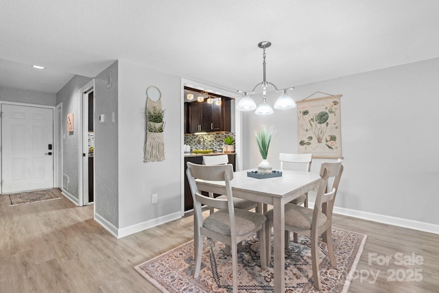 5192 Corbin Ln, Hickory, NC 28601 - dining room featuring light wood-type flooring and baseboards