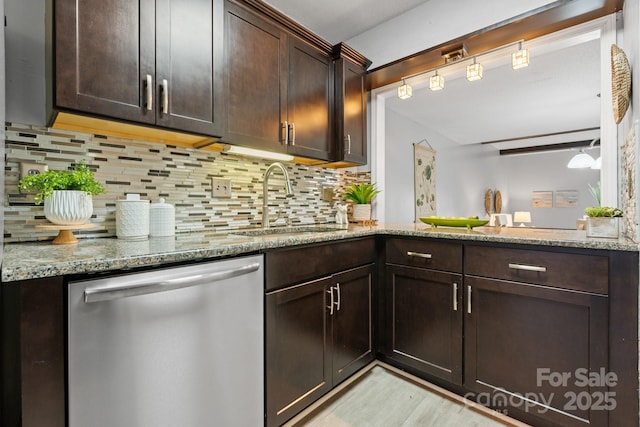 5192 Corbin Ln, Hickory, NC 28601 - bar featuring dishwasher, decorative backsplash, and light wood finished floors