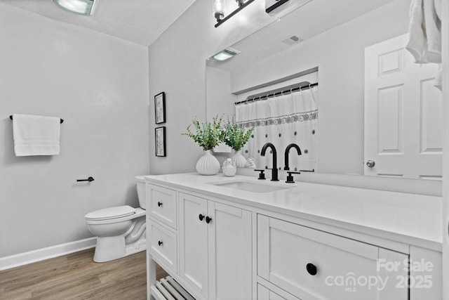 5192 Corbin Ln, Hickory, NC 28601 - bathroom with vanity and wood finished floors