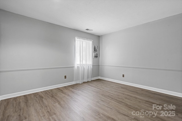 5192 Corbin Ln, Hickory, NC 28601 - unfurnished room with wood finished floors and baseboards