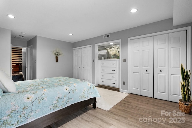 5192 Corbin Ln, Hickory, NC 28601 - bedroom featuring two closets, wood finished floors, and recessed lighting