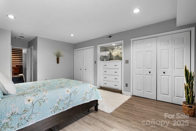 5192 Corbin Ln, Hickory, NC 28601 - bedroom featuring multiple closets, wood finished floors, and recessed lighting