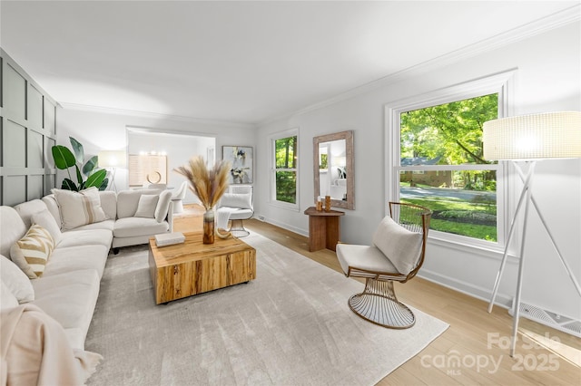 3519 Campbell Dr, Charlotte, NC 28205 - living area featuring light wood-style flooring and ornamental molding