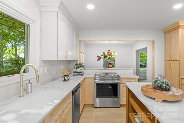 3519 Campbell Dr, Charlotte, NC 28205 - kitchen featuring stainless steel appliances, recessed lighting, light brown cabinets, light stone countertops, and tasteful backsplash