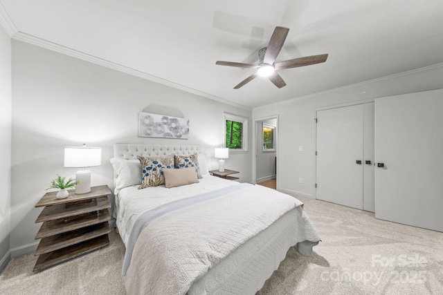 3519 Campbell Dr, Charlotte, NC 28205 - carpeted bedroom with ornamental molding, ceiling fan, and a closet