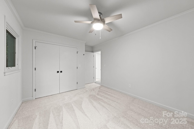 3519 Campbell Dr, Charlotte, NC 28205 - unfurnished bedroom featuring carpet flooring, crown molding, a closet, and ceiling fan