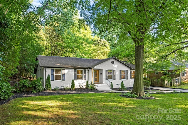 3519 Campbell Dr, Charlotte, NC 28205 - ranch-style house with stucco siding and a shingled roof