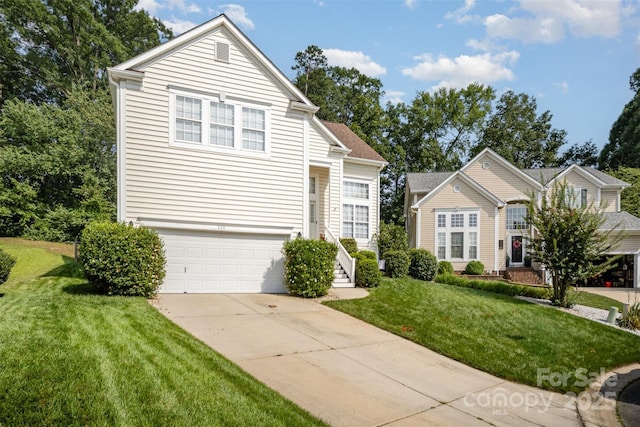 220 Holmes Ct, Concord, NC 28027 - view of front facade featuring driveway, a front lawn, and a garage