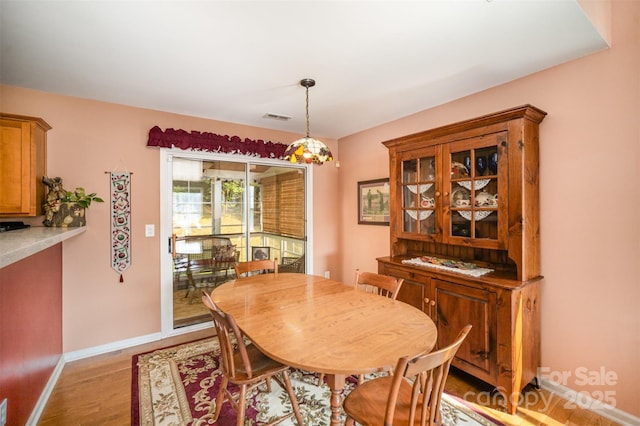 220 Holmes Ct, Concord, NC 28027 - dining space featuring light wood-style floors and baseboards