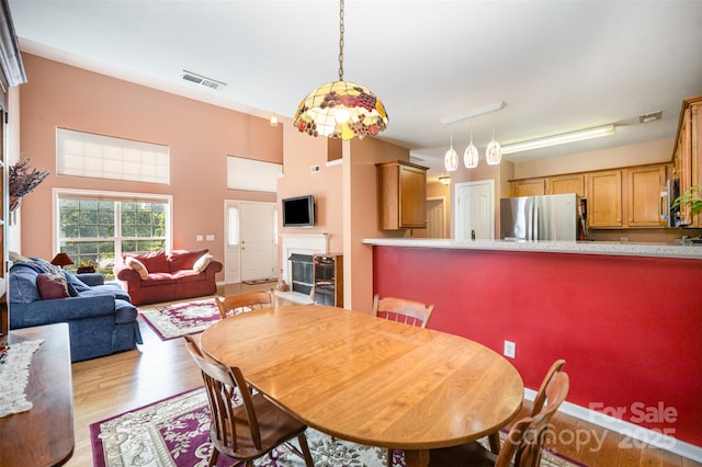 220 Holmes Ct, Concord, NC 28027 - dining space with light wood-style flooring