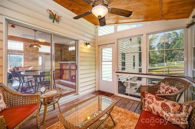 220 Holmes Ct, Concord, NC 28027 - sunroom / solarium featuring wood ceiling, plenty of natural light, a ceiling fan, wood walls, and hardwood / wood-style floors