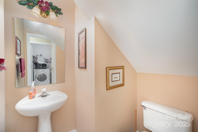 220 Holmes Ct, Concord, NC 28027 - half bathroom featuring washer / clothes dryer and lofted ceiling
