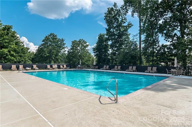 220 Holmes Ct, Concord, NC 28027 - community pool with a patio area