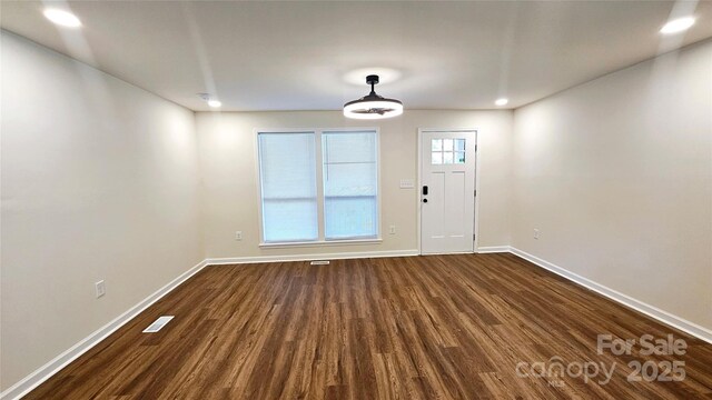 703 Central Dr NW, Concord, NC 28027 - entryway with dark wood finished floors and recessed lighting