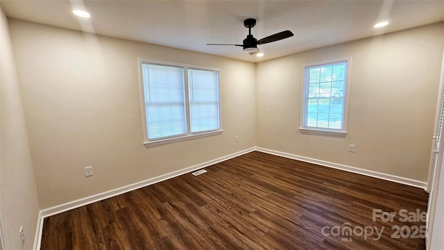 703 Central Dr NW, Concord, NC 28027 - unfurnished room with dark wood-style flooring, ceiling fan, and recessed lighting