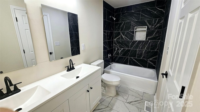 703 Central Dr NW, Concord, NC 28027 - bathroom with marble look tile flooring, double vanity, and  shower combination