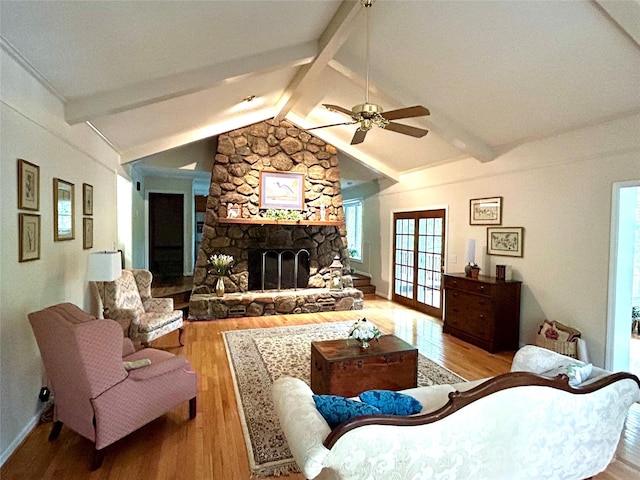 143 Uwharrie Ct Unit 1080, 1081, Mount Gilead, NC 27306 - living area with wood finished floors, ceiling fan, and a fireplace