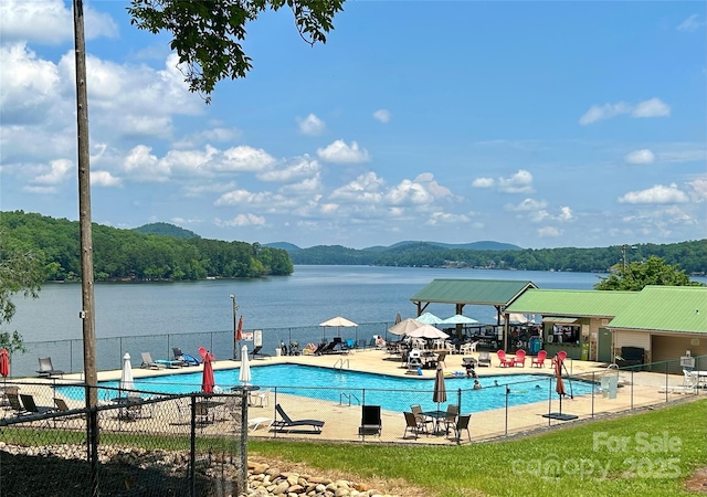 143 Uwharrie Ct Unit 1080, 1081, Mount Gilead, NC 27306 - community pool with a water view and a patio area
