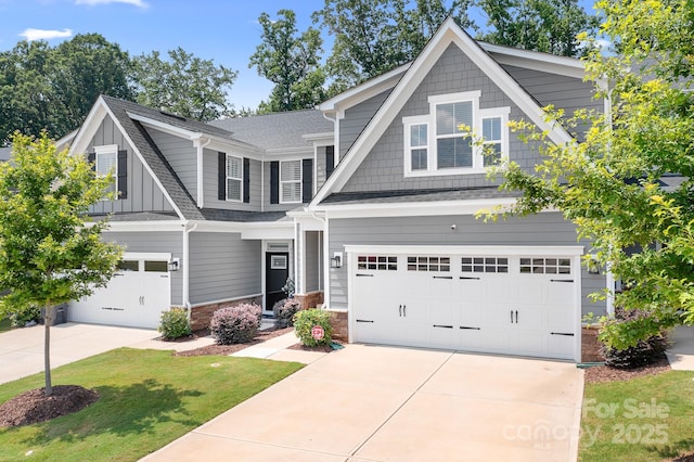 6365 Ashton Park Dr, Denver, NC 28037 - craftsman-style house featuring a garage, driveway, and board and batten siding