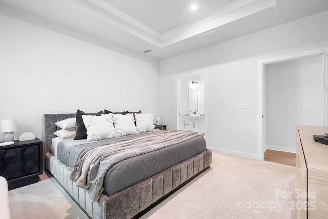 6365 Ashton Park Dr, Denver, NC 28037 - bedroom with a tray ceiling, light carpet, and ensuite bathroom