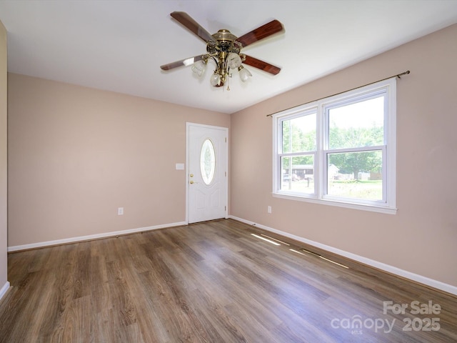 618 Springfield Dr NW, Concord, NC 28027 - foyer featuring a ceiling fan and wood finished floors