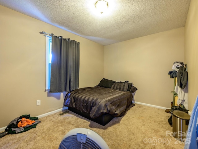 618 Springfield Dr NW, Concord, NC 28027 - bedroom with carpet flooring and a textured ceiling
