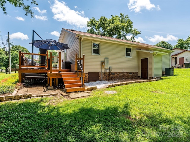 618 Springfield Dr NW, Concord, NC 28027 - back of house with a wooden deck, a lawn, and crawl space
